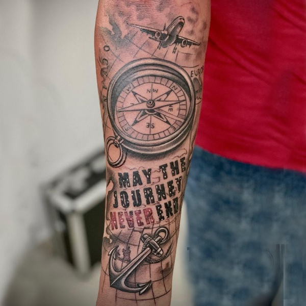 Gorgeous compass, anchor, and quote tattoo
