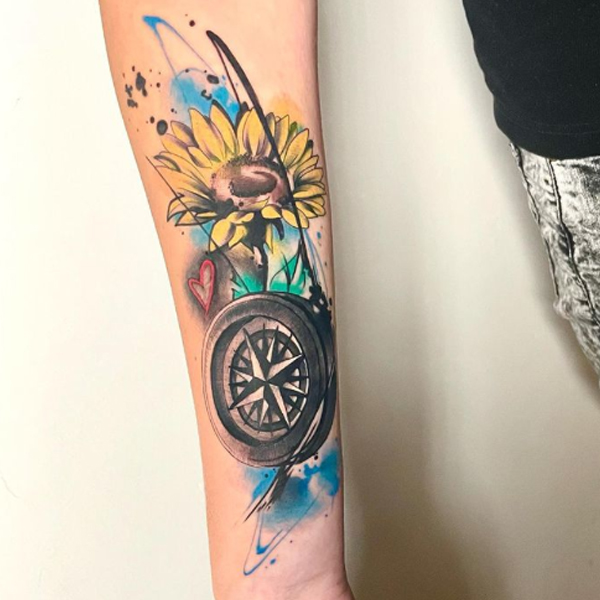 Awesome sunflower and compass watercolor splash tattoo design