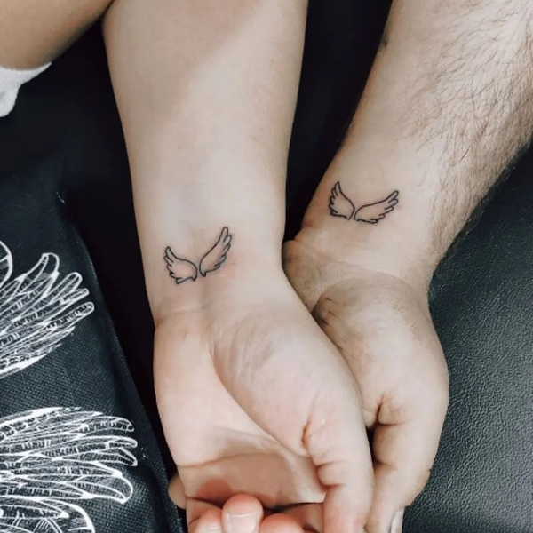 Small and cute Angel wings tattoo