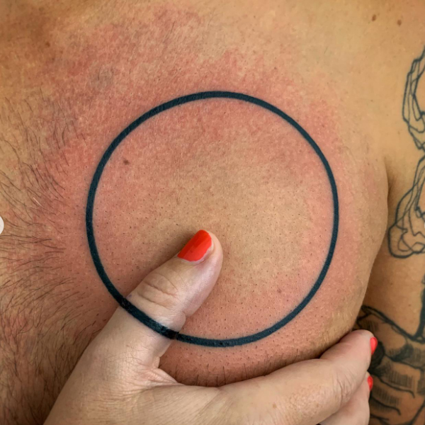 Unique Broken circle piece tattoo