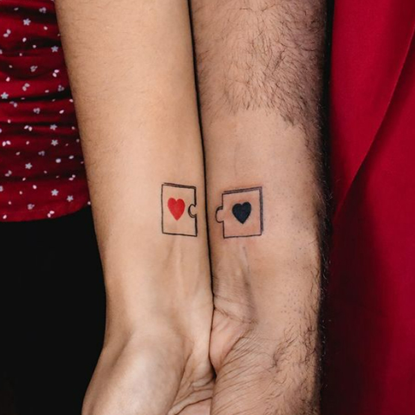 Stunning Puzzle piece tattoo for a couple