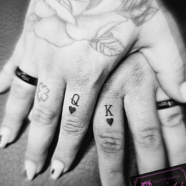 Minimal king and queen tattoo for a couple
