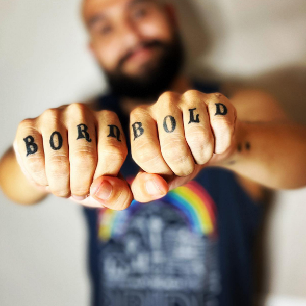 Black born bold tattoo for men