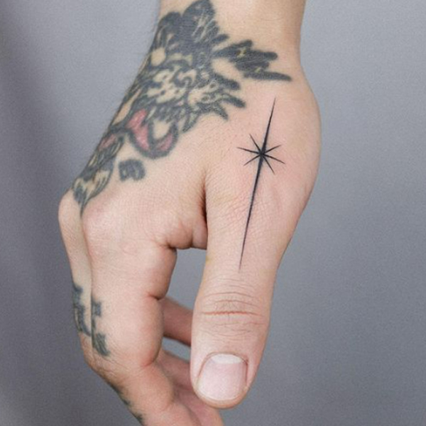 Black North star tattoo
