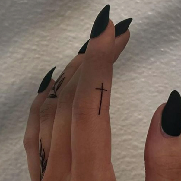  Fine line Cross tattoo on finger