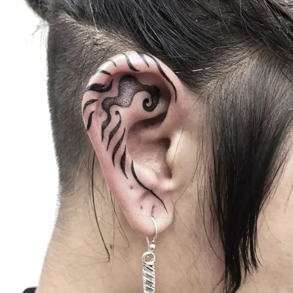 Black bold spiral tattoo