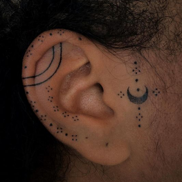 Graceful Dot work ear tattoo