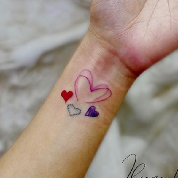 Beautifully designed small heart tattoo
