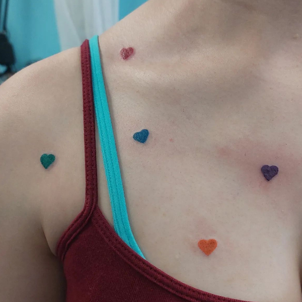  Lovely Colorful hearts tattoo