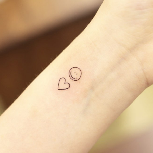 Cute Heart with smile tattoo