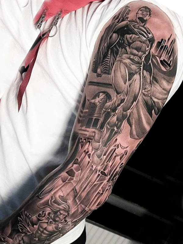 Awesome superman full sleeve tattoo design