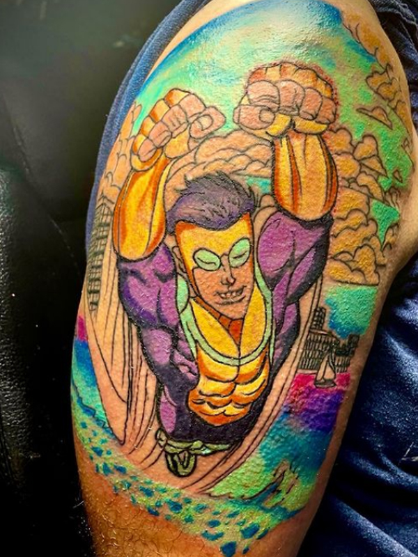 Superhero Robbie Baldwin's tattoo on the bicep