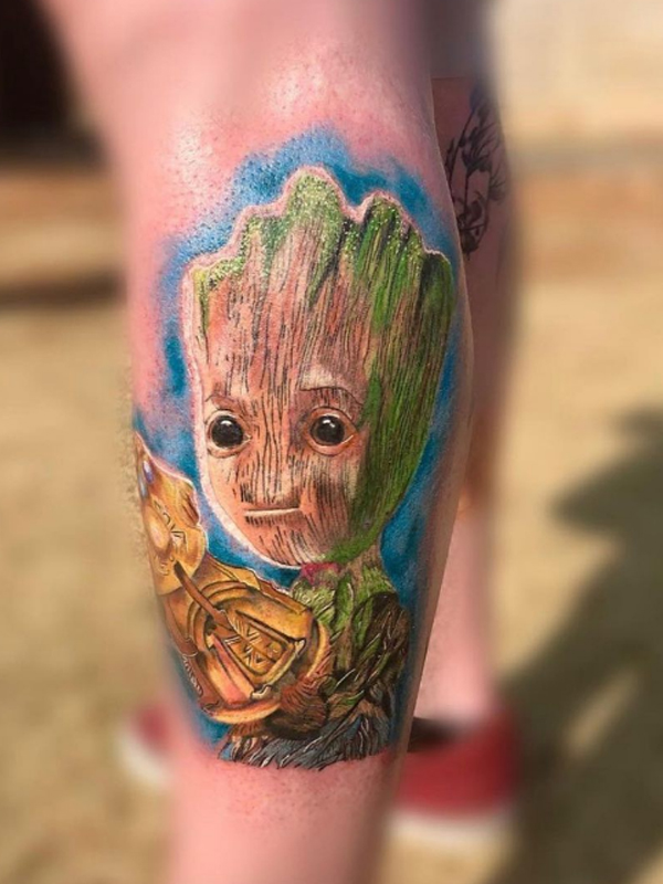 Fabulous baby groot tattoo on the leg
