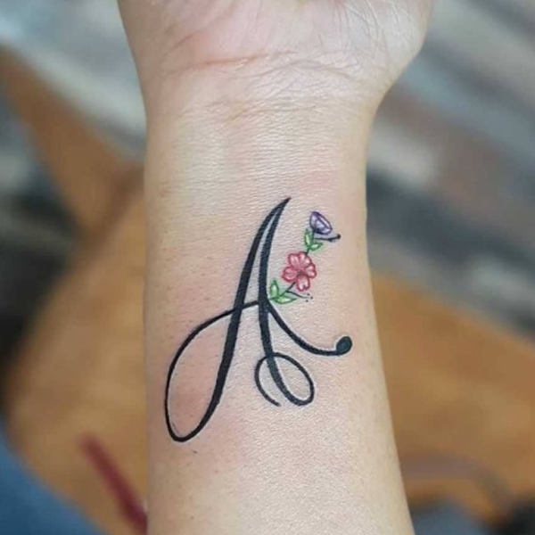 Gorgeous a-letter and flower tattoo design