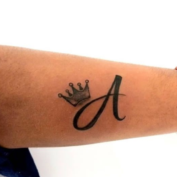 Classy letter-A and a Crown tattoo on the hand
