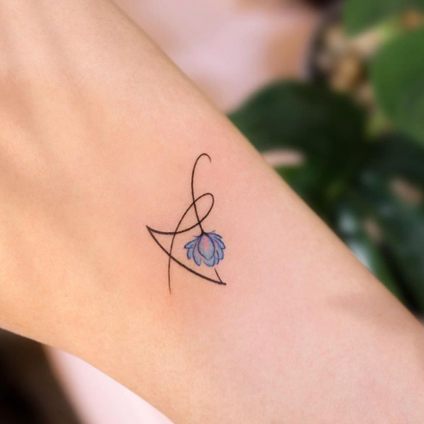 Elegant letter-A with a cute flower tattoo