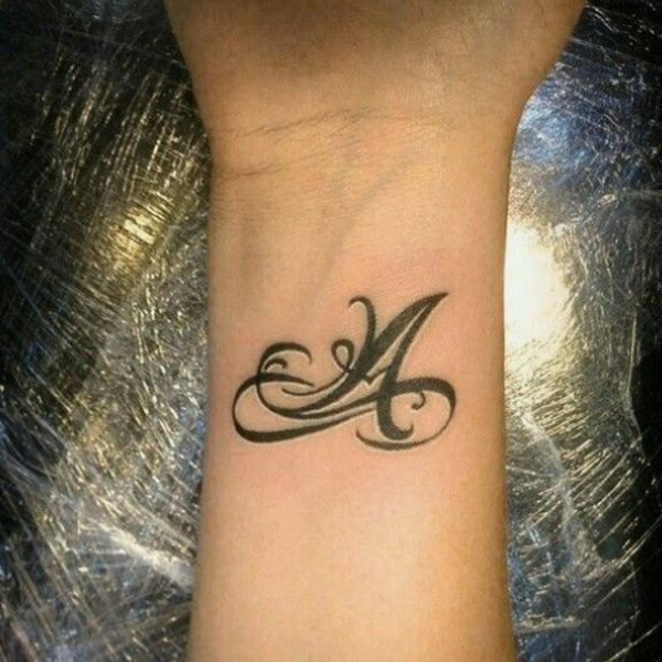 Amazing A-letter calligraphy-style infinity tattoo design