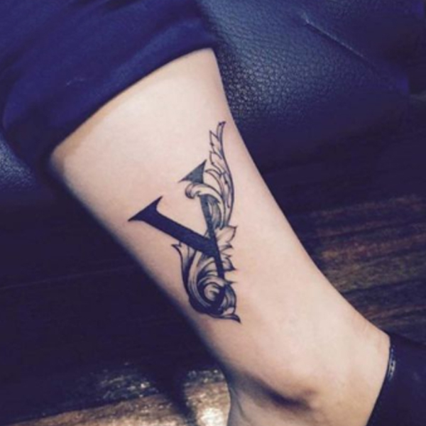 Awesome v-letter Calligraphy design tattoo