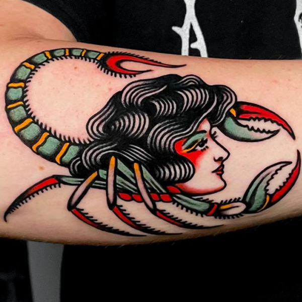 Beautiful old-school Scorpion Girl tattoo