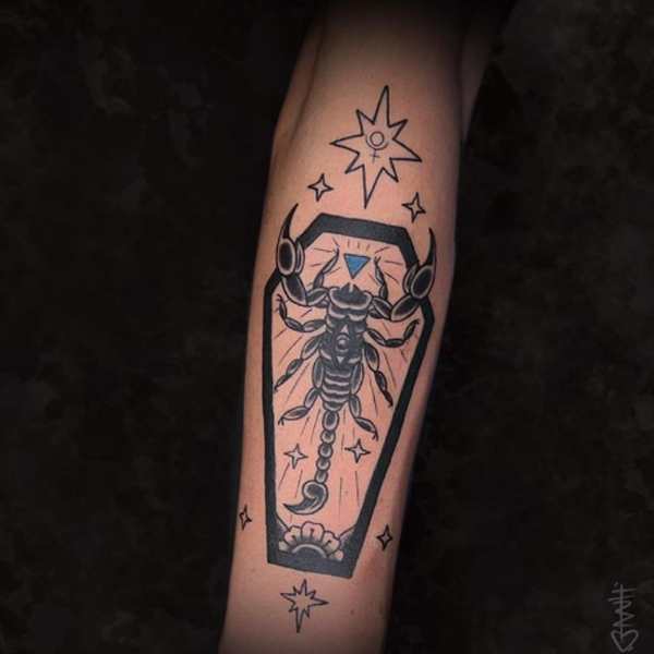 Splendid black old-school Scorpio with a star tattoo