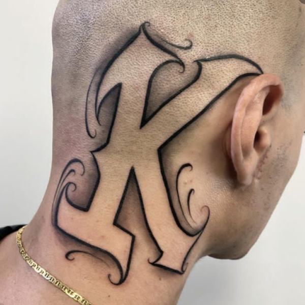 Awesome k-letter negative shading tattoo 