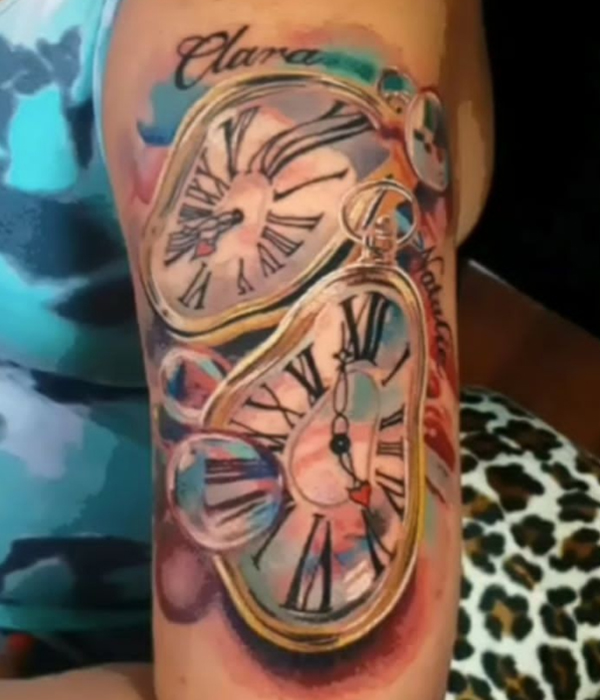 Colorful melting Clocks design tattoo