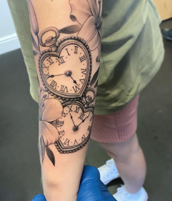 Creative heart clocks and flower tattoo design