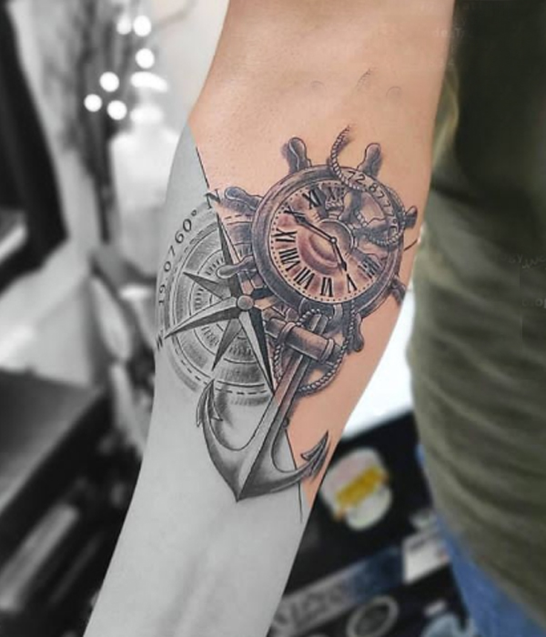 Combination of a clock, compass, and anchor tattoo design