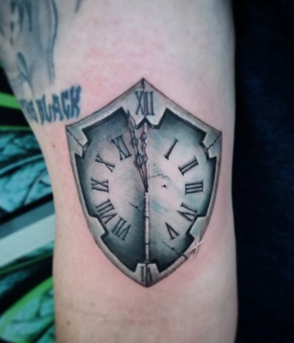 Creative shield clock tattoo design