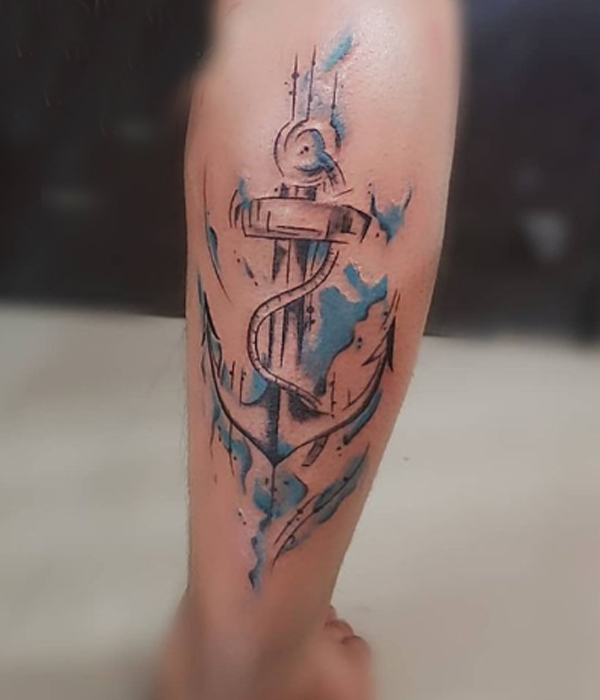 Awesome watercolor Anchor tattoo over the calf