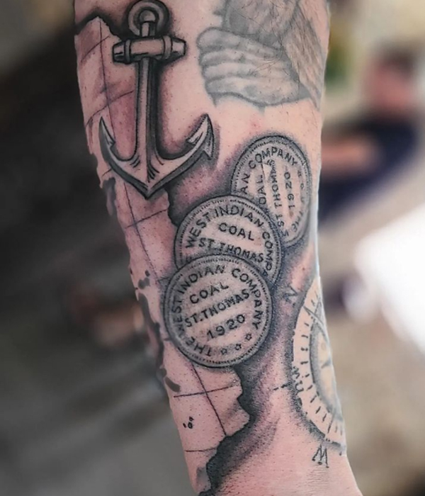 Amazing anhcor and healed coin tattoo