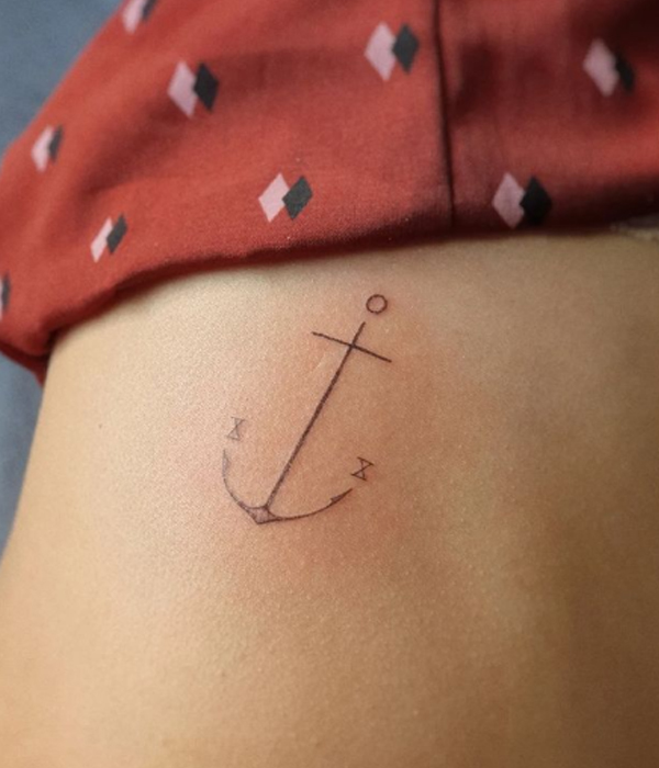 Fine line anchor design tattoo