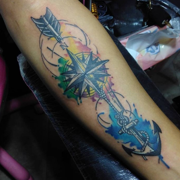 Stunning watercolor arrow, nautical star, and anchor tattoo design