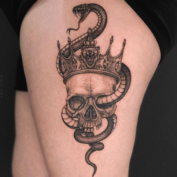 Elegant skull crown with snake black and grey tattoo