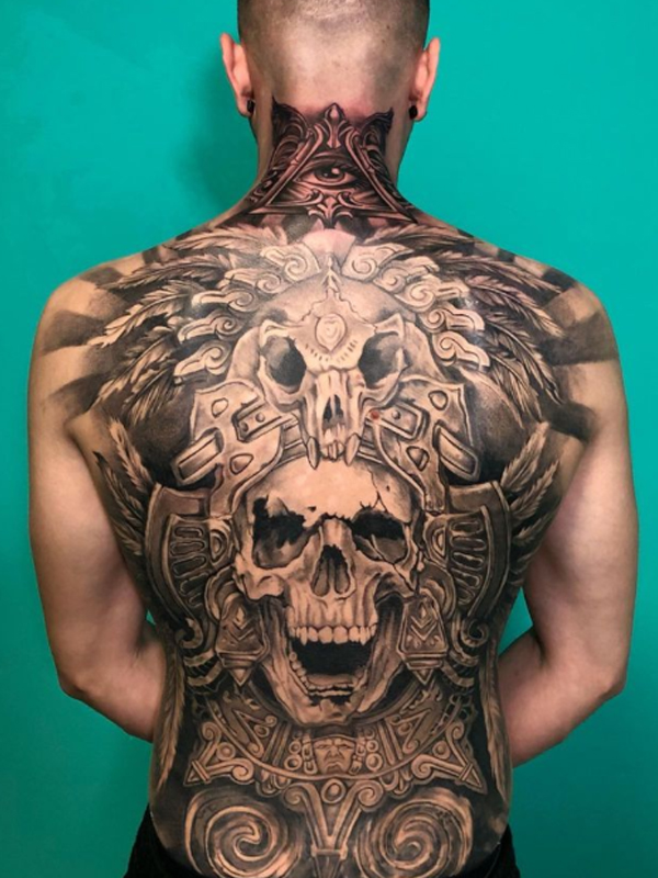 Fantastic skull detailing black and grey tattoo