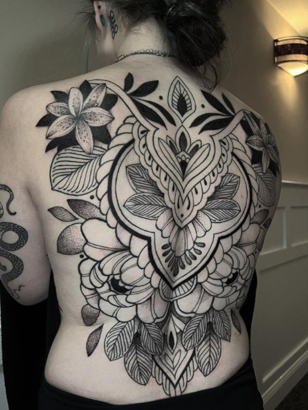 Beautiful black mandala flower tattoo design