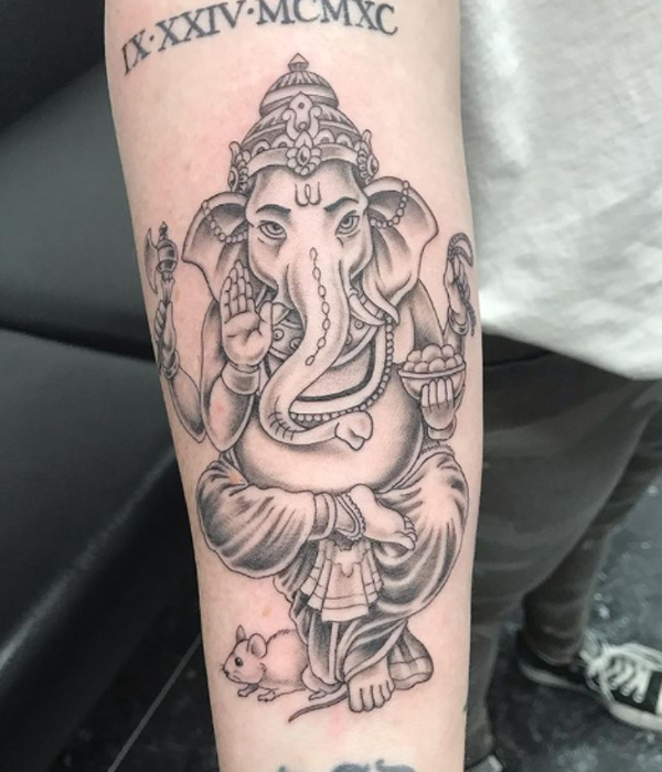 Awesome Lord Ganesh Sitting posture tattoo