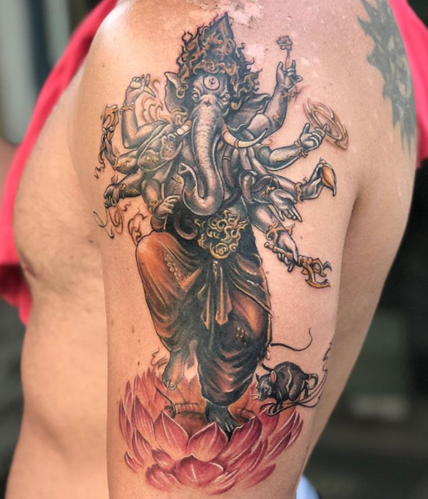 Stunning Dashbhuj Ganesha tattoo with his all weapon 
