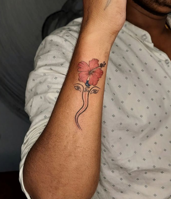 Pretty Ganesha symbol and flower tattoo design 