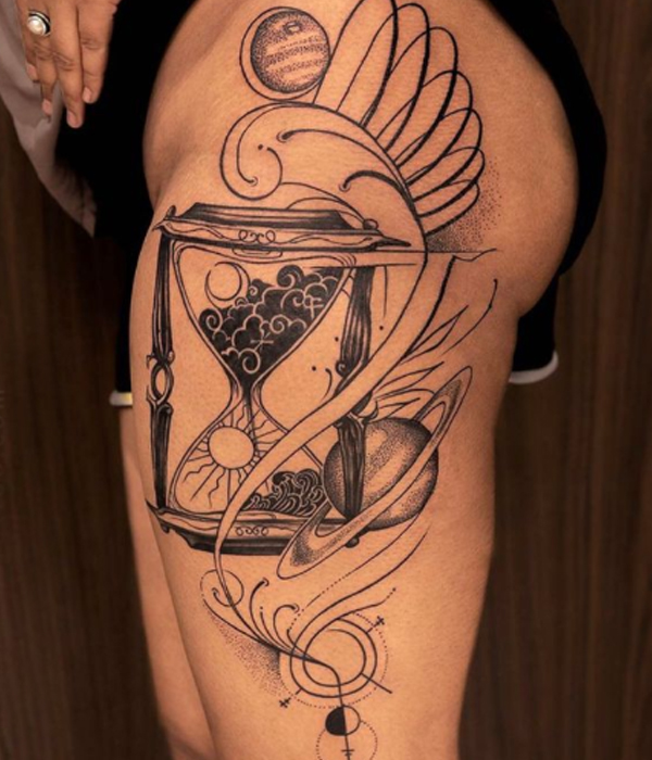 Stunning black and grey hourglass and universe tattoo 