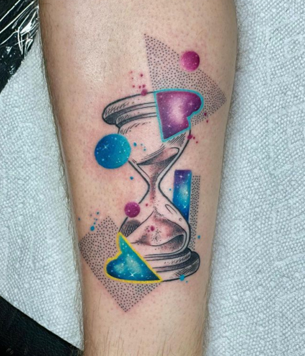 Stunning colorful hourglass and dot work tattoo