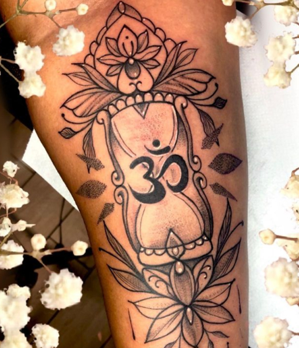 Beautiful hourglass dot work religious tattoo design