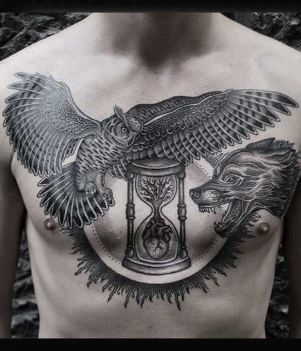 Stunning hourglass, owl, and wolf tattoo design