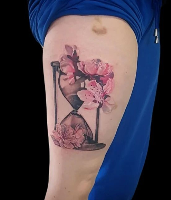 Beautiful hourglass and cherry blossom flower tattoo