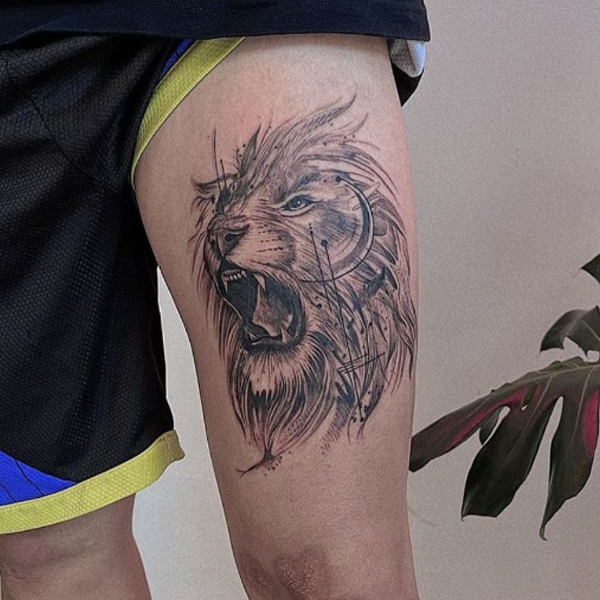Awesome abstract lion over the thigh