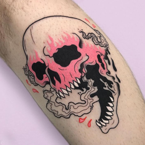 Pretty pink skull smoke tattoo