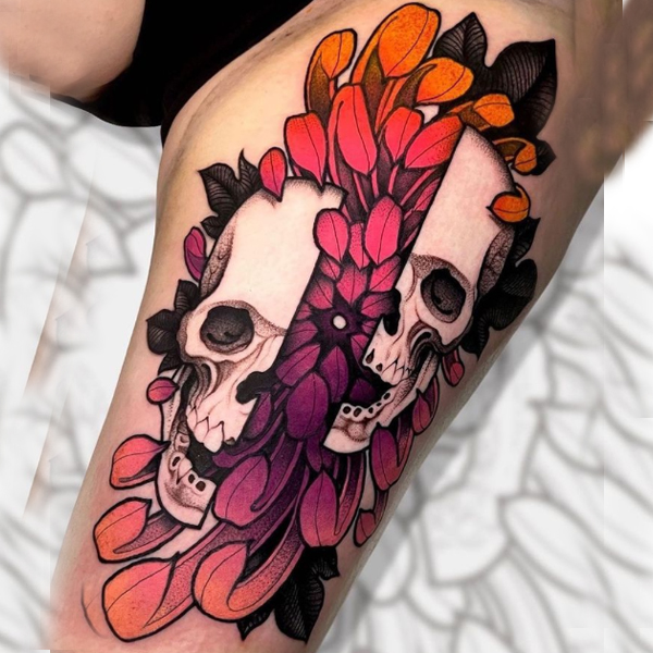 A split skull with Chrysanthemums flower tattoo design