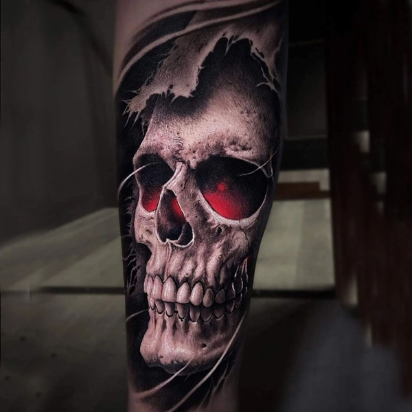Attractive skull hyper-realism red eye tattoo