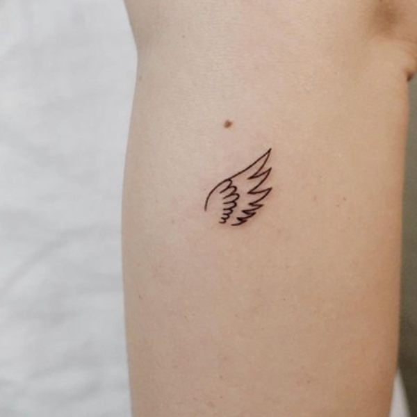 Tiny cute wing minimal tattoo design