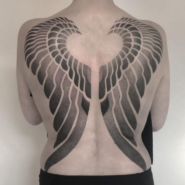 Awesome black dot work wings on the back